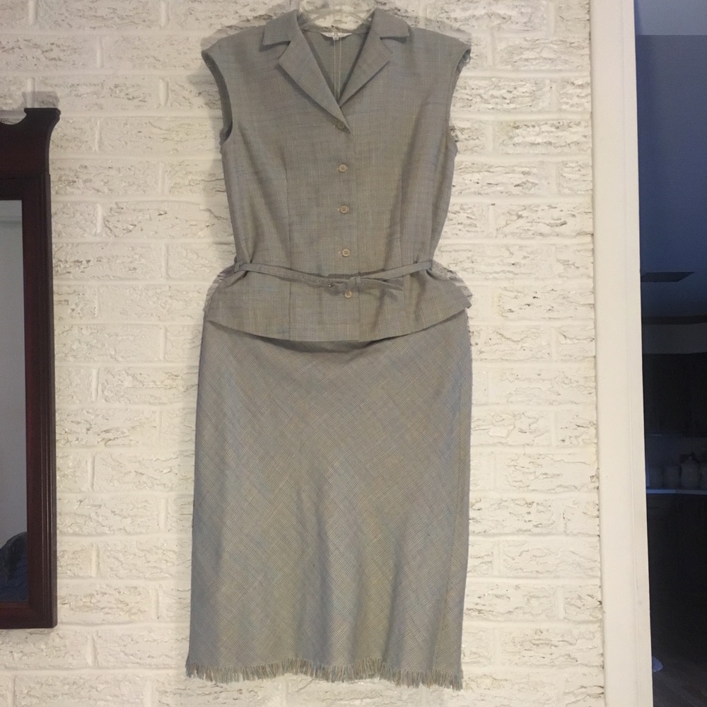 Lady’s suit top and skirt separated